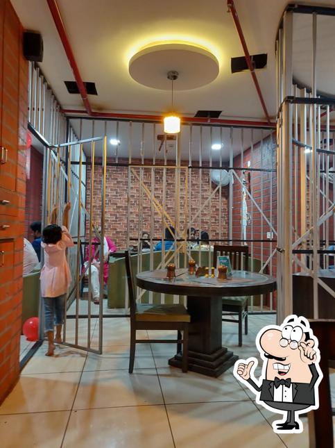 Check out how The lockup Restro And Cafe with disco looks inside
