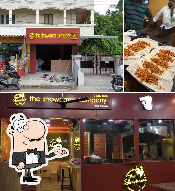 Take a seat at one of the tables at The shawarma company