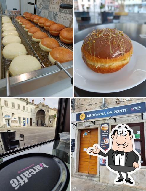 Questa è la immagine che mostra la interni e cibo di Krofarna Da Ponte