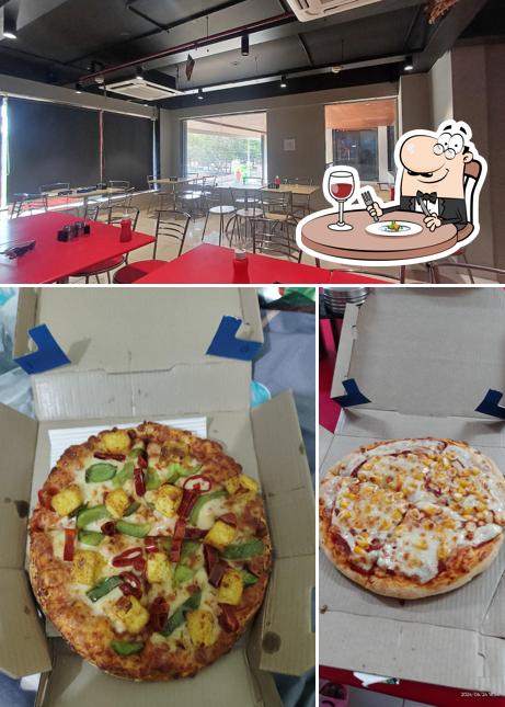 Check out the picture showing food and interior at Domino's Pizza Risali, Bhilai