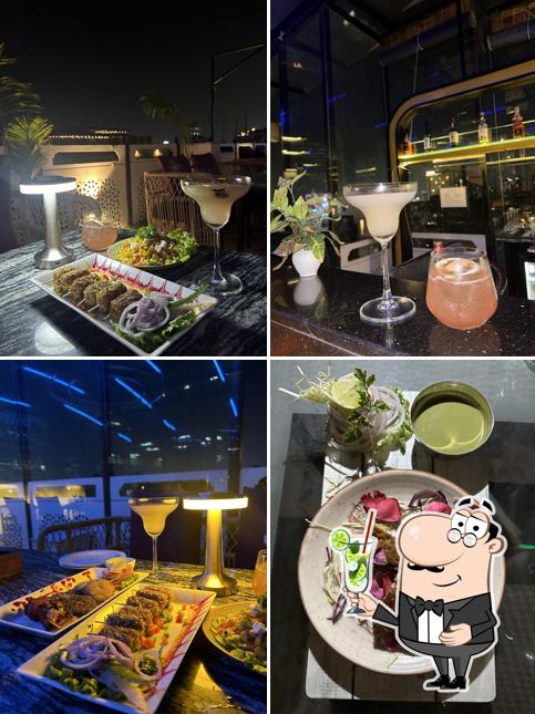 Enjoy a beverage at Taverns Lounge and Curry House