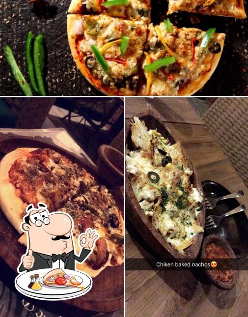 Get pizza at Cafe Kazbaah