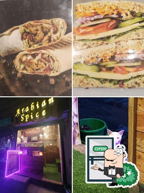 This is the picture displaying exterior and food at Arabian Spice