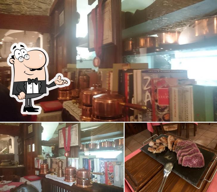 Siediti a un tavolo di Ristorante L'Arquebusier