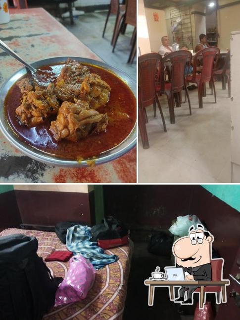 Take a seat at one of the tables at Satyanarayan Hindu Hotel