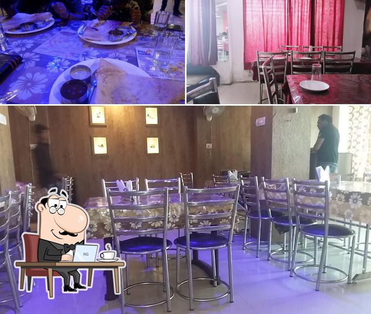 Take a seat at one of the tables at Manokamana Foods