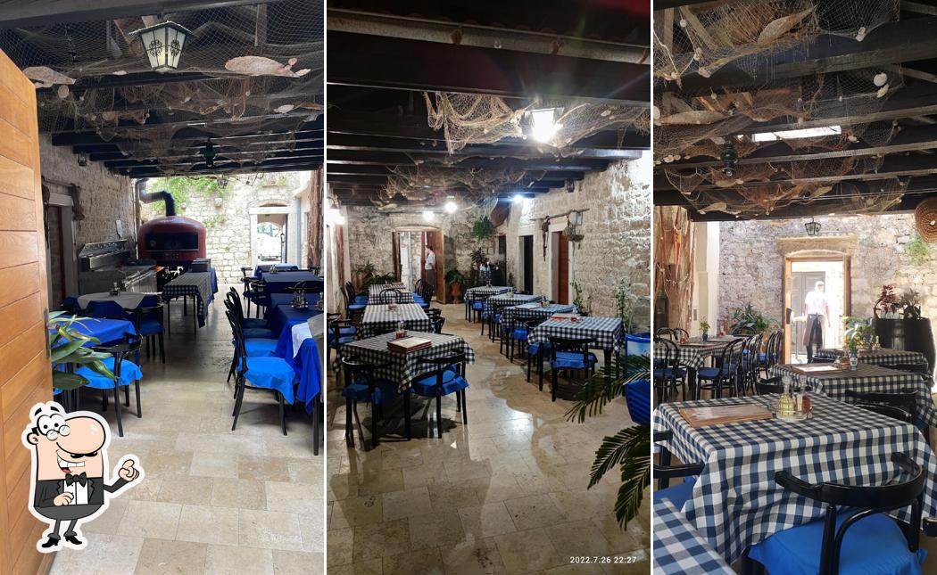 Dai un'occhiata agli interni di Tavern Riva
