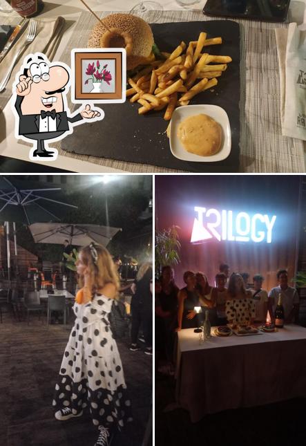 Questa è la immagine che mostra la interni e cibo di Bar La Racchetta