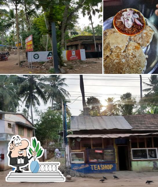 The photo of exterior and food at Vishnu HOTEL