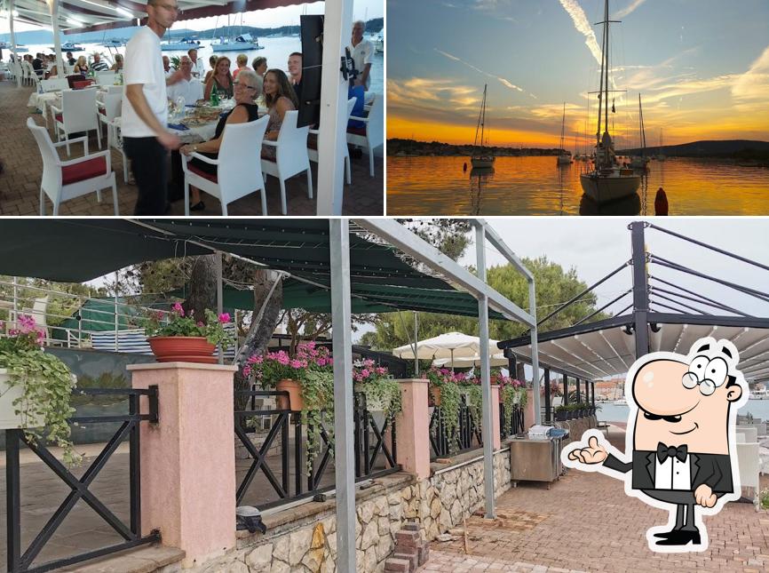Questa è la immagine che presenta la interni e esterno di Restoran Dalmatinka