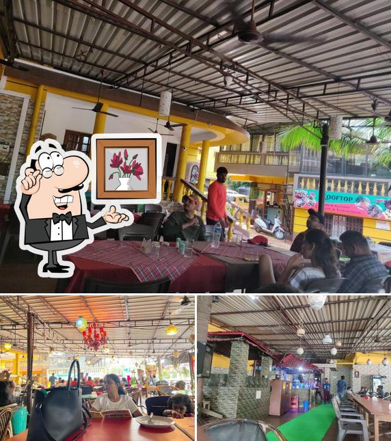 Take a seat at one of the tables at Indian Handi Restaurant