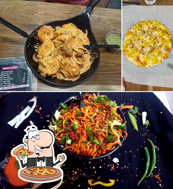 Get pizza at Foodiez Hub