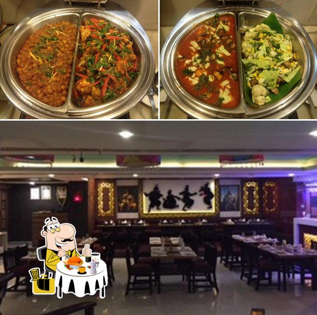 The photo of food and interior at Pind Balluchi Grills & Platters