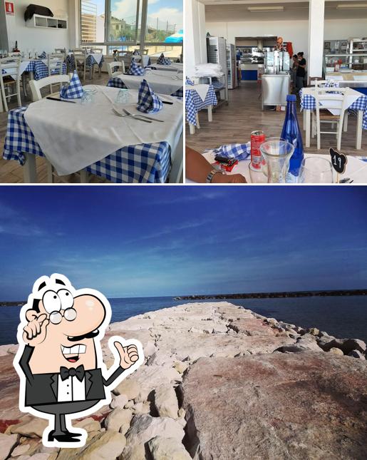 Questa è la foto che mostra la interni e esterno di Ristorante Lo Squalo
