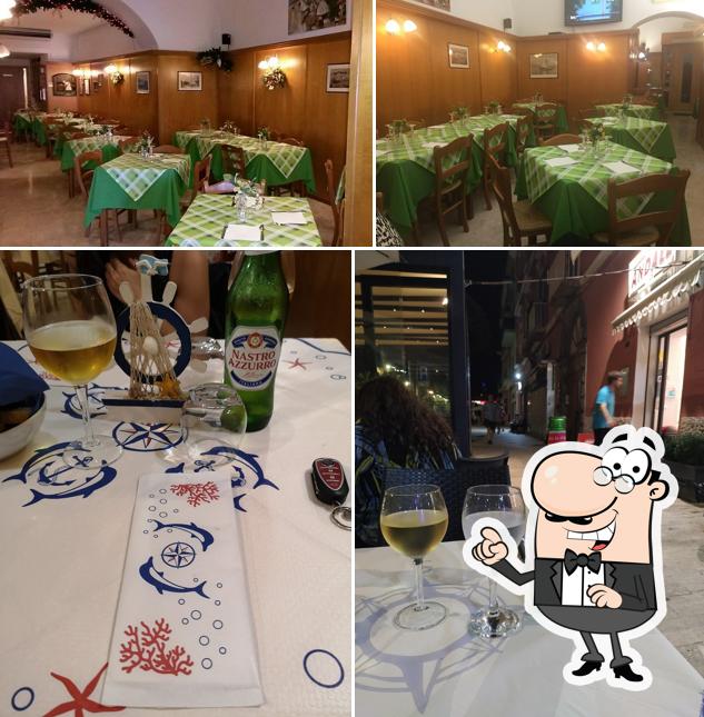 Trattoria Pizzeria Il Mandracchio si caratterizza per la interni e bevanda