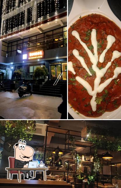 Take a seat at one of the tables at BHIMAS Restaurant & Hotel