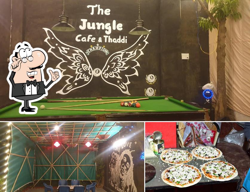 The picture of interior and pizza at The Jungle Cafe pushkar