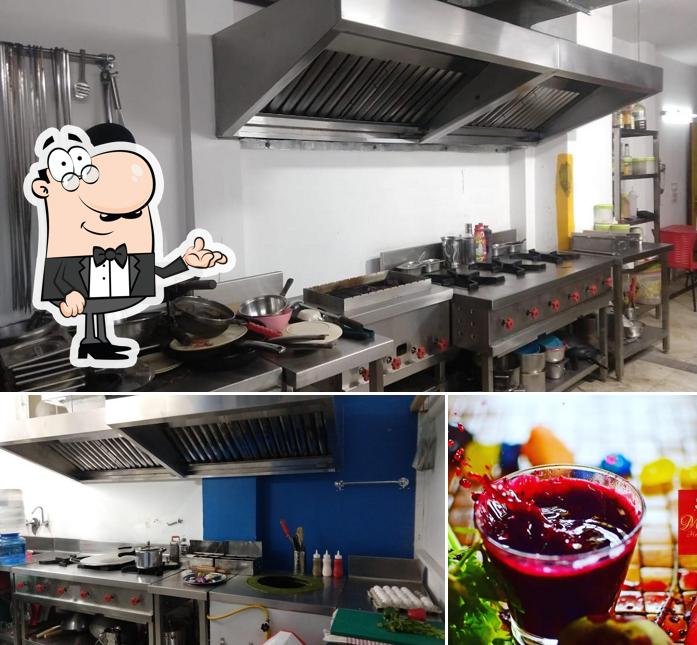 Check out the image depicting interior and beverage at LeMorich restaurant in Malviya Nagar