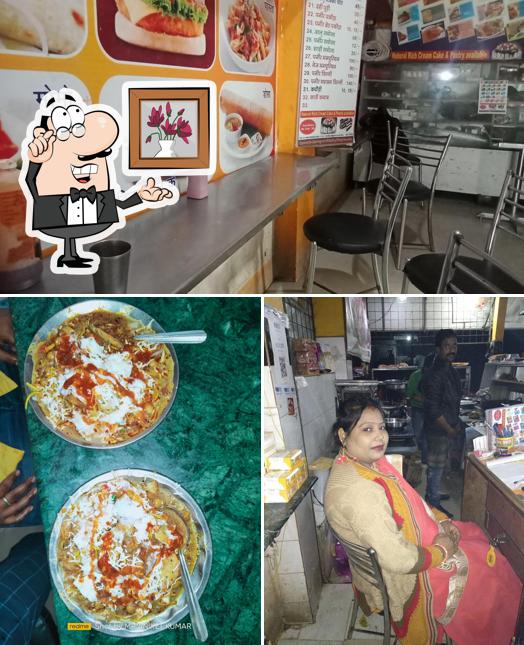 This is the photo showing interior and pizza at Hind Dairy