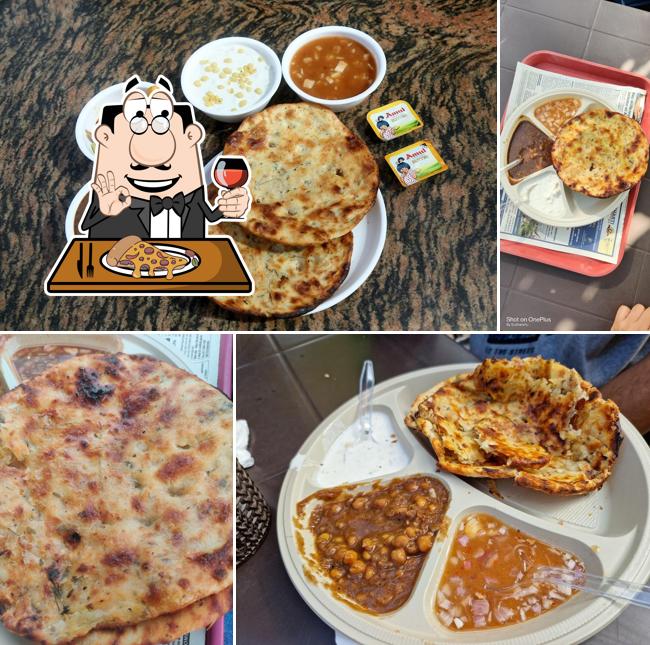 Try out pizza at Pyare Lal Amritsari