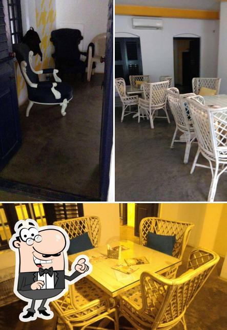 Take a seat at one of the tables at House #22