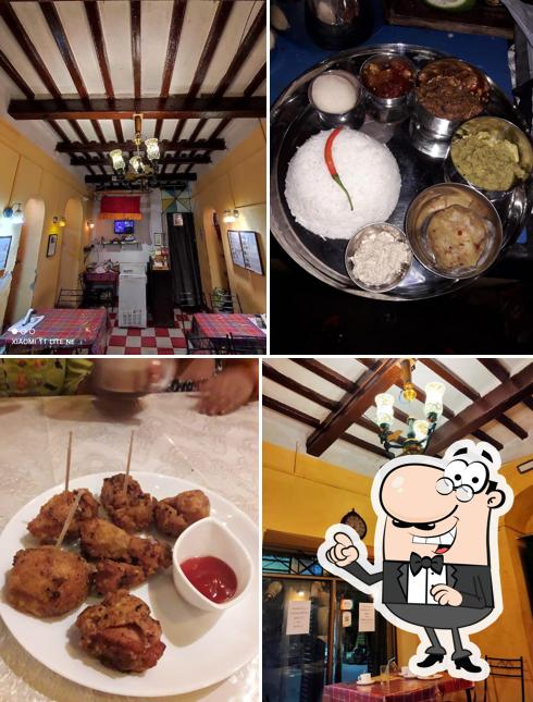 Take a seat at one of the tables at BoiThek / বইThek