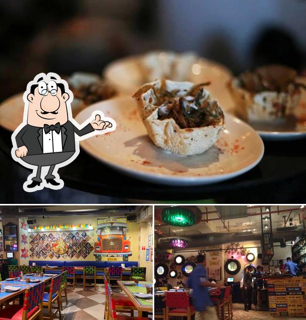 The photo of interior and food at Dhaba By Claridges