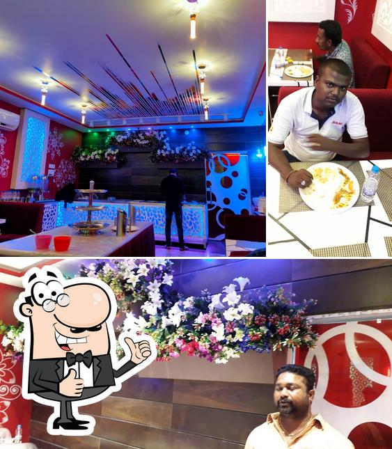 Look at this picture of Ma Usha Hotel