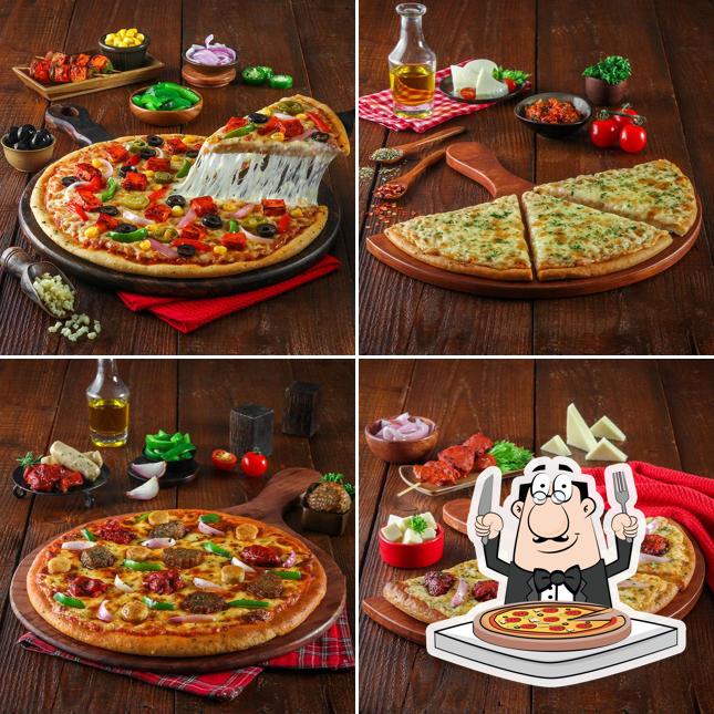 Get pizza at Oven Story