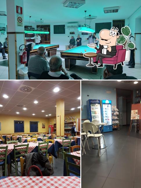 Siediti a un tavolo di Packy Bar Pizzeria