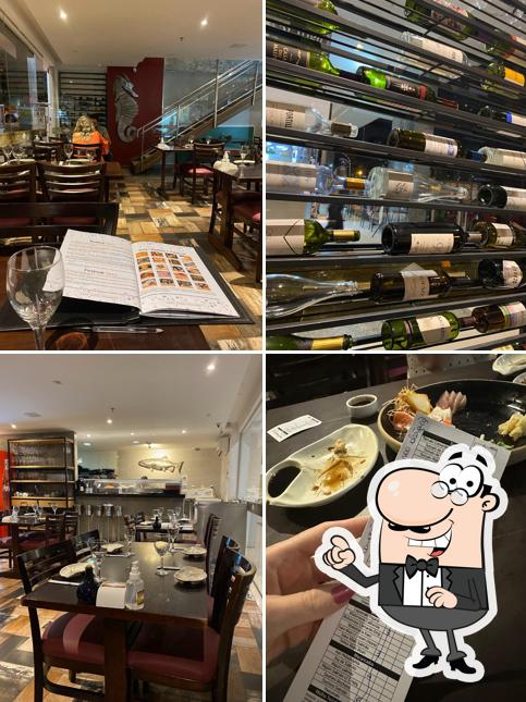 Sente em uma das mesas no Yasu Sushi