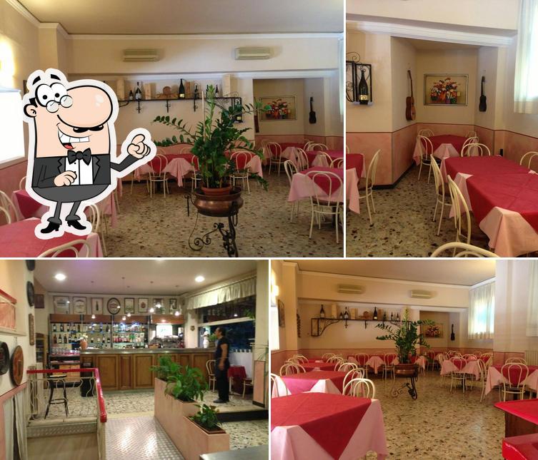 Dai un'occhiata agli interni di Osteria Del Ponte