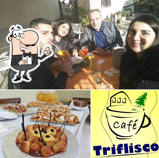 Dai un'occhiata agli interni di Café Triflisco