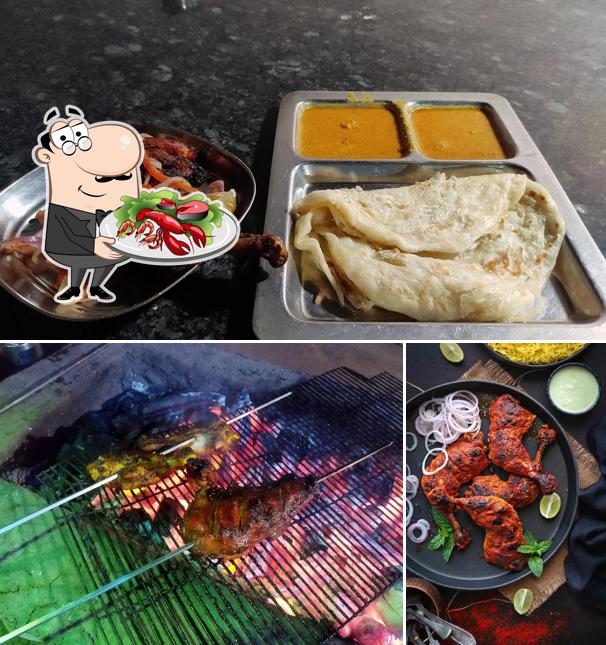 Order seafood at Spicy Village Restaurant and Mess