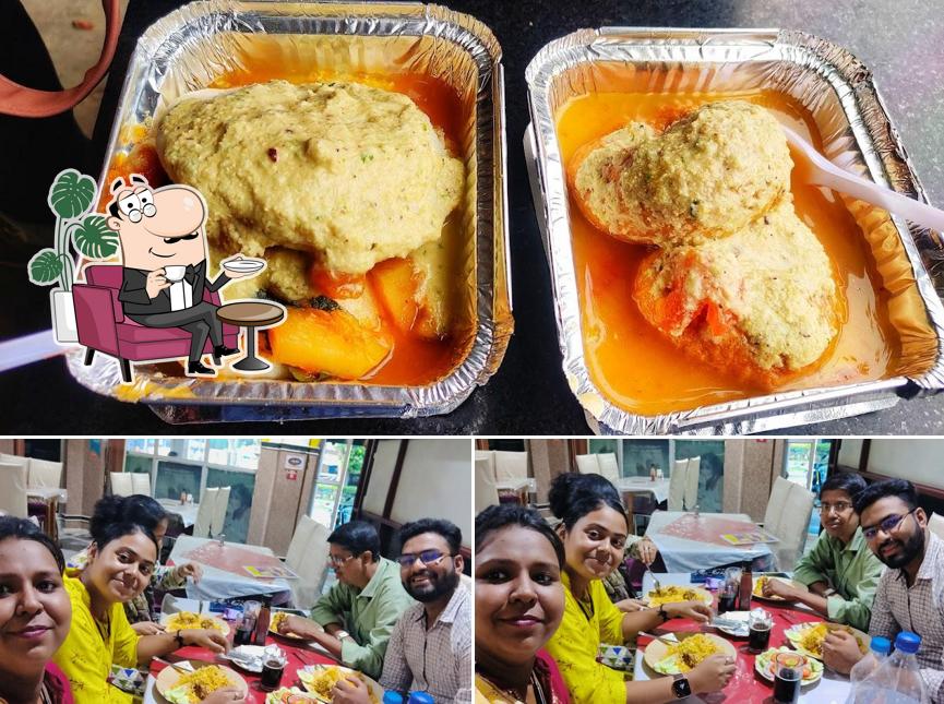 Take a look at the photo depicting interior and food at South Indian Fast Food
