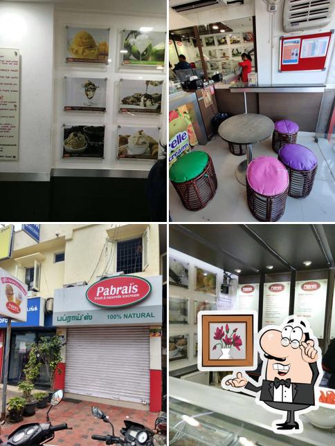 Take a seat at one of the tables at Pabrai's Fresh & Naturelle Ice Creams - Besant Nagar, Chennai