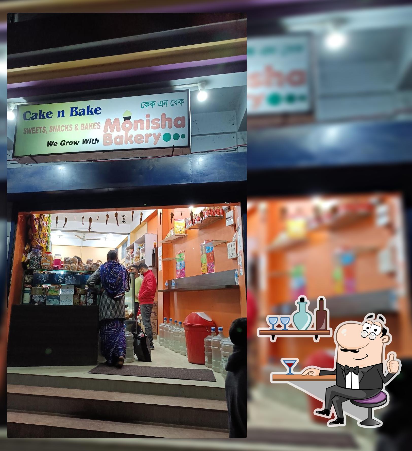 Take a seat at one of the tables at Cake & Bake, Monisha Bakery