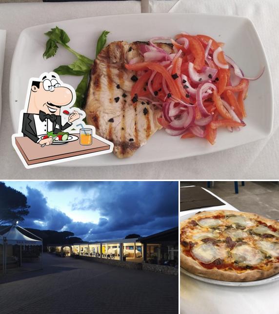 Guarda la foto che presenta la cibo e esterno di Baia Blu La Tortuga Restaurant