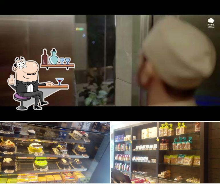 Check out the photo showing interior and food at Atul Bakery Ved Road Singanpore, Suart