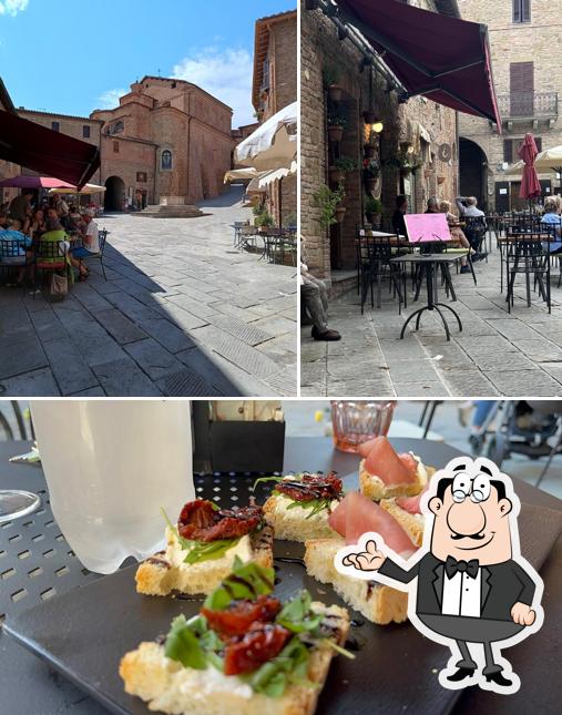 La foto della interni e cibo di Il Caffè della Piazza