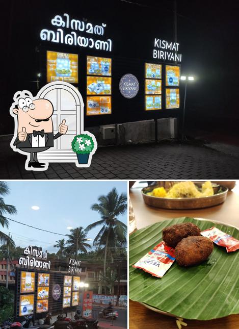 Among various things one can find exterior and dining table at Kismat Biriyani
