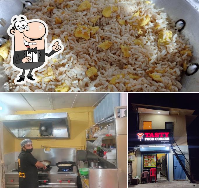 Take a look at the picture depicting interior and food at Tasty Food Corner