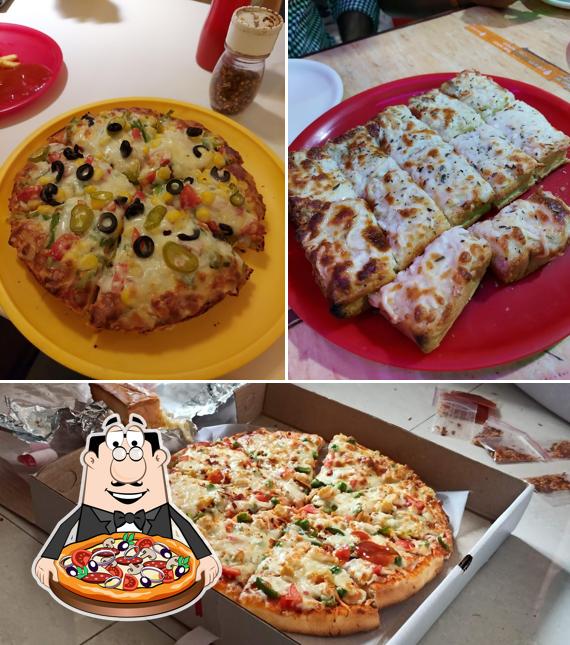 Get pizza at Tazza Pizza
