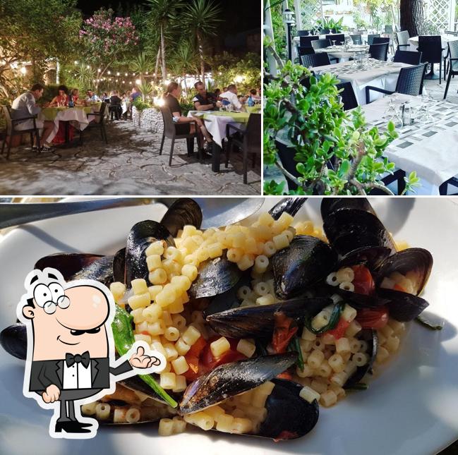 La immagine della interni e cibo di Ristorante da Peppino