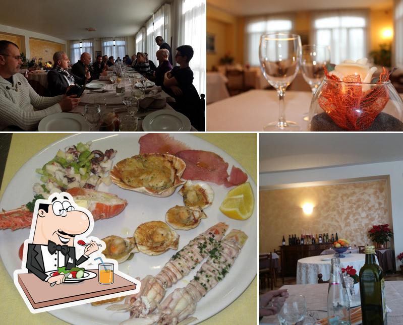 La foto di cibo e tavolo da pranzo da Hotel Dotto