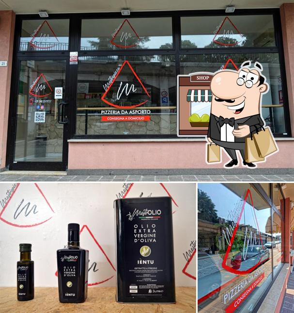 Questa è la immagine che mostra la esterno e bevanda di Mastro Pizza