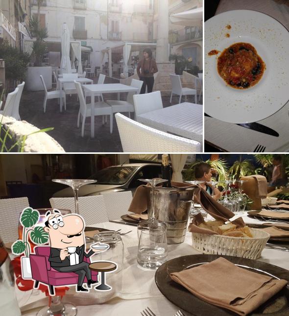 La immagine della interni e cibo di MI AMI BAR E RISTORANTE
