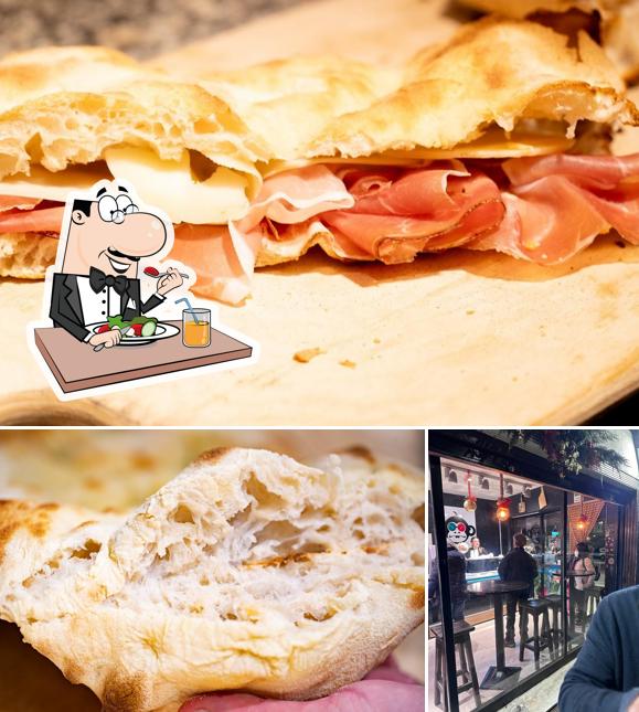 Questa è la immagine che presenta la cibo e esterno di Monhos Pizza