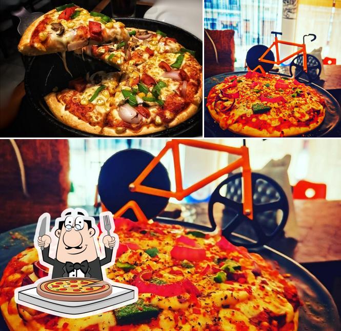 Order pizza at Sip's 'N' Bite's cafe