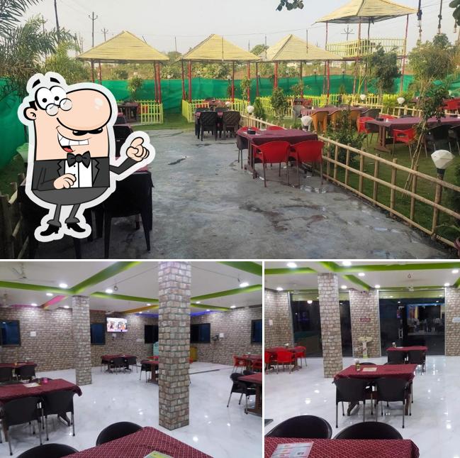 Take a seat at one of the tables at Shri Samrat Dhaba & Family Restaurant